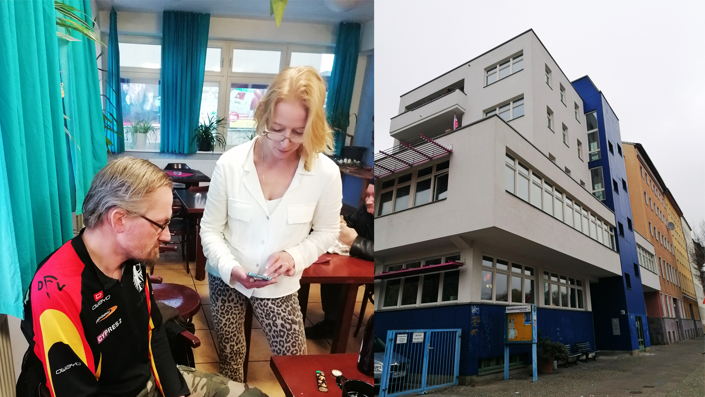 Links: Andrea zeigt einem Bewohner des Hauses Nostitzstraße ein Foto von Schuhen, die der Mann als Spende erhält. Rechts: Das Haus Nostitzstraße. Im FCZB-Podcast verrät Andrea, wie ihr die Weiterbildung IT-Know-how für den Wiedereinstieg geholfen hat, Selbstvertrauen und einen neuen Job zu finden. Fotos: Anne Forman